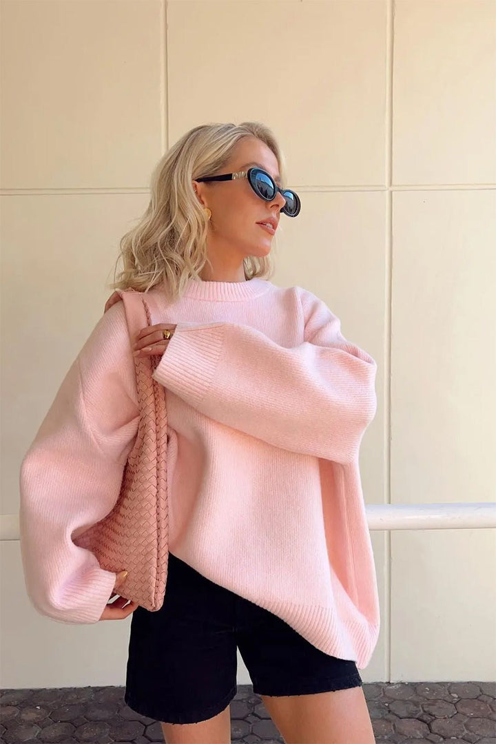 Elegante maglione oversize donna rosa a maniche lunghe, con scollo rotondo, per un comfort alla moda.