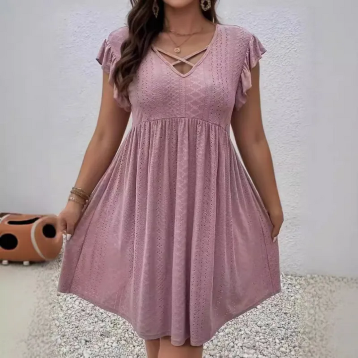 Mini abito estivo donna, design con scollo a V e maniche corte a volant, un capo essenziale casual chic.