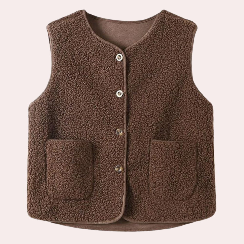 Gilet da donna in sherpa trendy, con bottoni, perfetto per un look casual chic invernale.