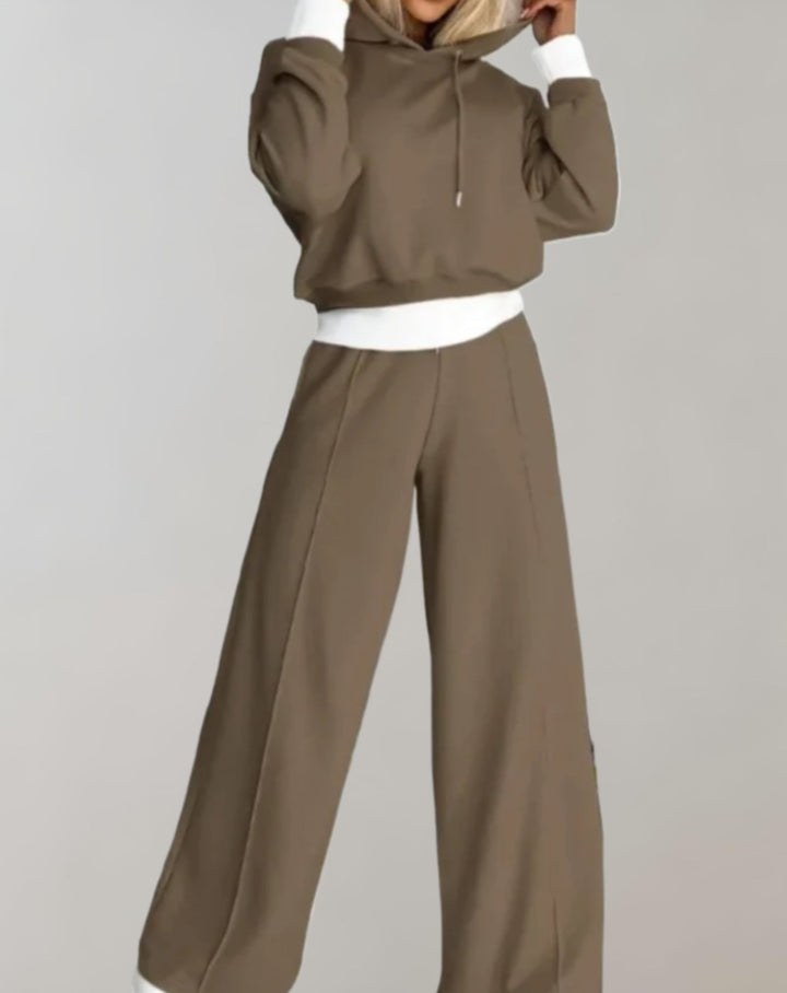 Moda femminile: completo due pezzi aderente per un outfit autunnale elegante. Ideale per l'ufficio o serate chic.