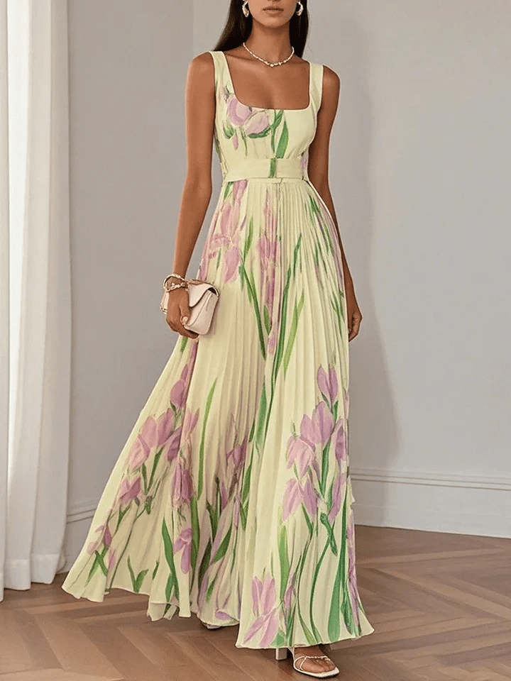 Abito lungo senza maniche da donna, vestito fluido e comodo, ideale per un'eleganza estiva senza sforzo.