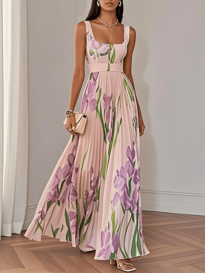 Abito maxi donna elegante, vestito senza maniche in tessuto fluido, perfetto per cerimonie estive.