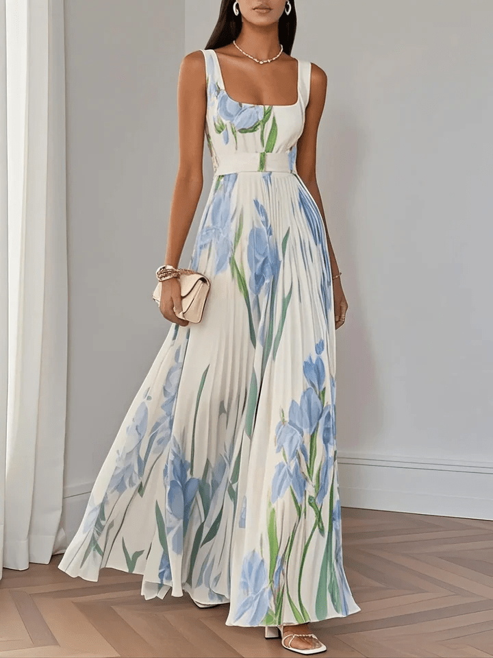 Maxi dress estivo senza maniche, vestito fluido e confortevole per un look raffinato da giorno o sera.
