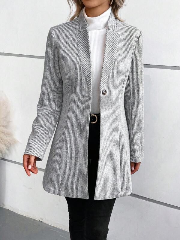 Giacca blazer donna grigia slim fit. Capo versatile per abbigliamento femminile e look primaverile/autunnale.