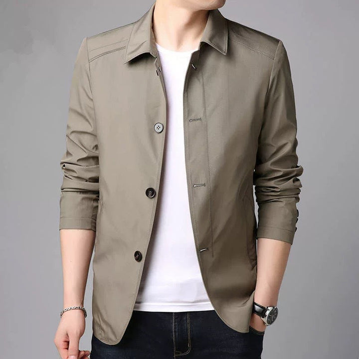 Giacca leggera grigia da uomo, con colletto moderno a strati. Perfetta per un comfort casual e uno stile attuale.