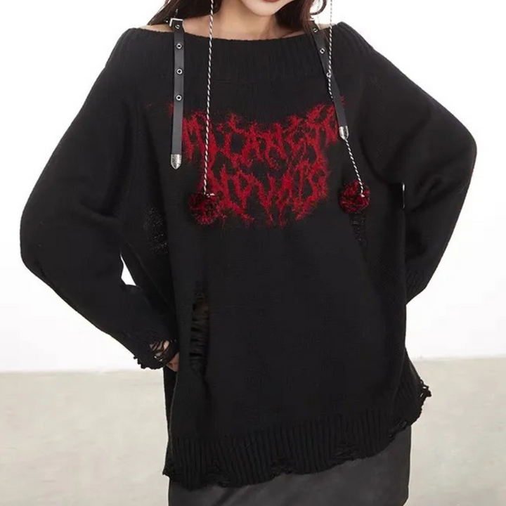Maglione oversize donna grigio, vestibilità comoda e design moderno. Ideale per un outfit casual-elegante.