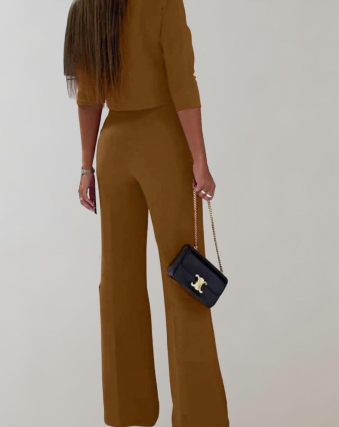 Top 3/4 elegante del set donna due pezzi. Capi coordinati, moda femminile per outfit sofisticati.
