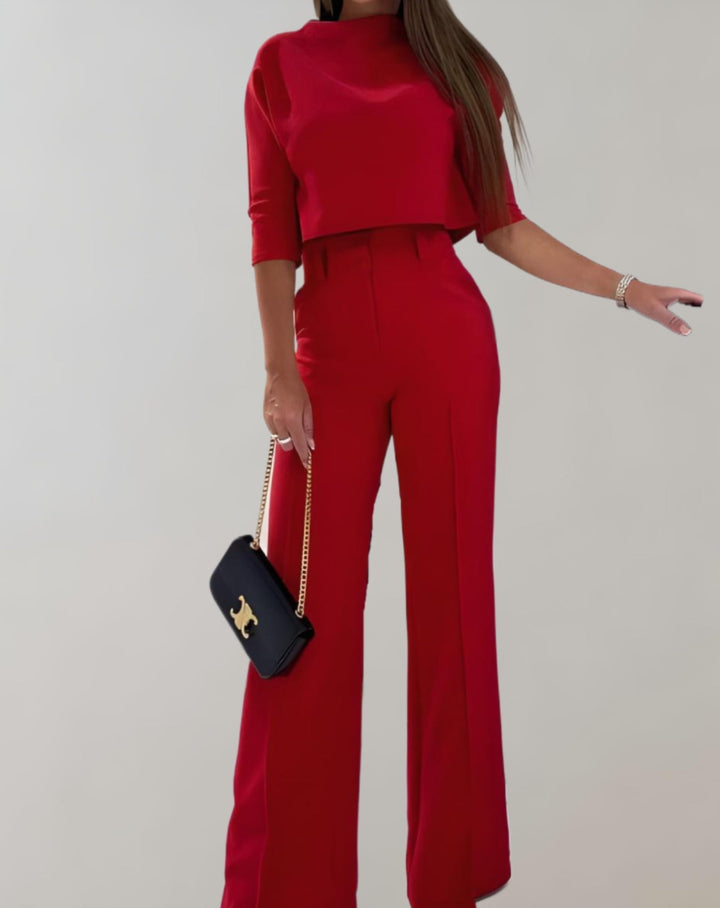 Completo due pezzi estivo da donna: top 3/4 e pantaloni a gamba larga. Perfetto per outfit casual o chic.