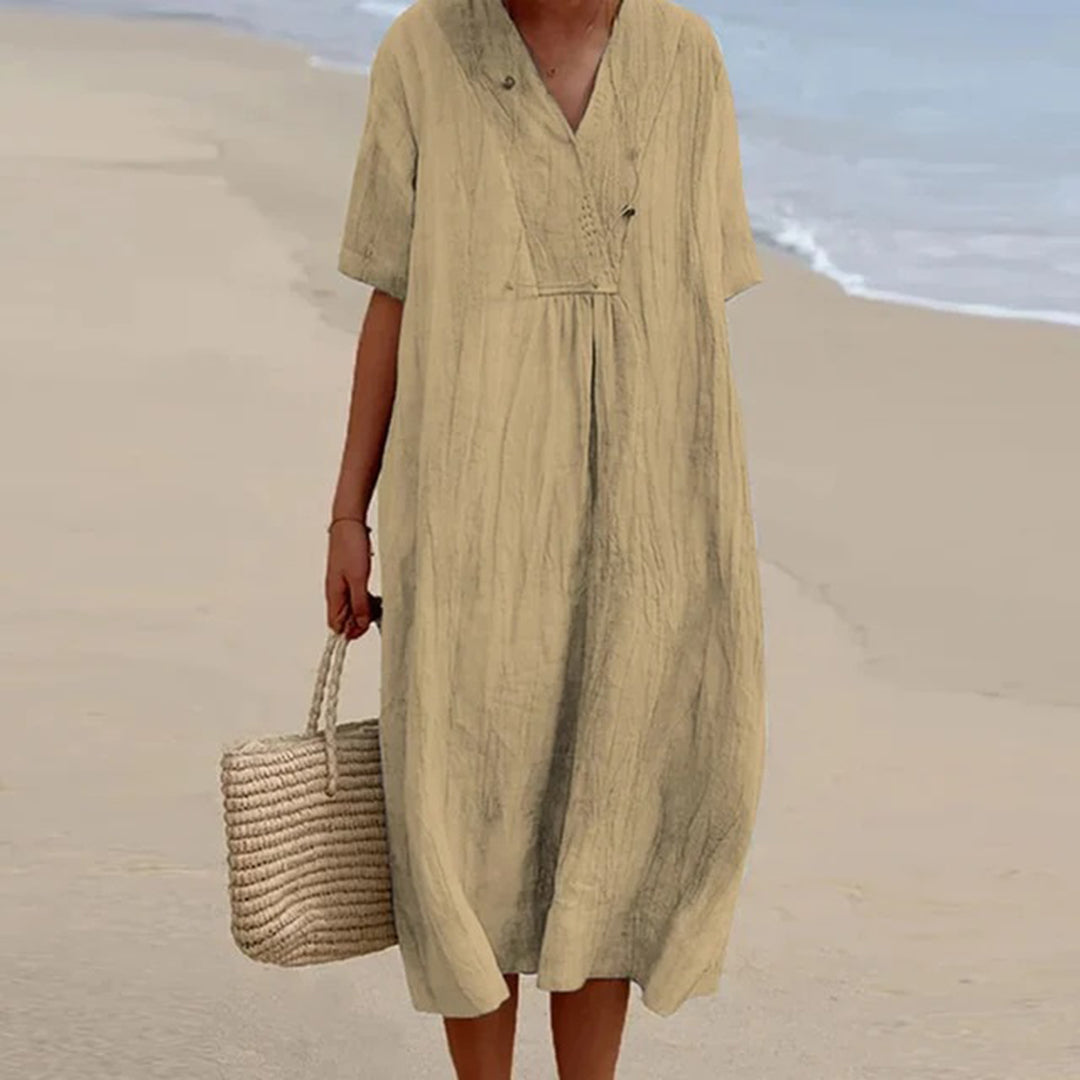 Abito midi estivo da donna, vestibilità comoda e rilassata, versatile per vacanze o un look elegante.