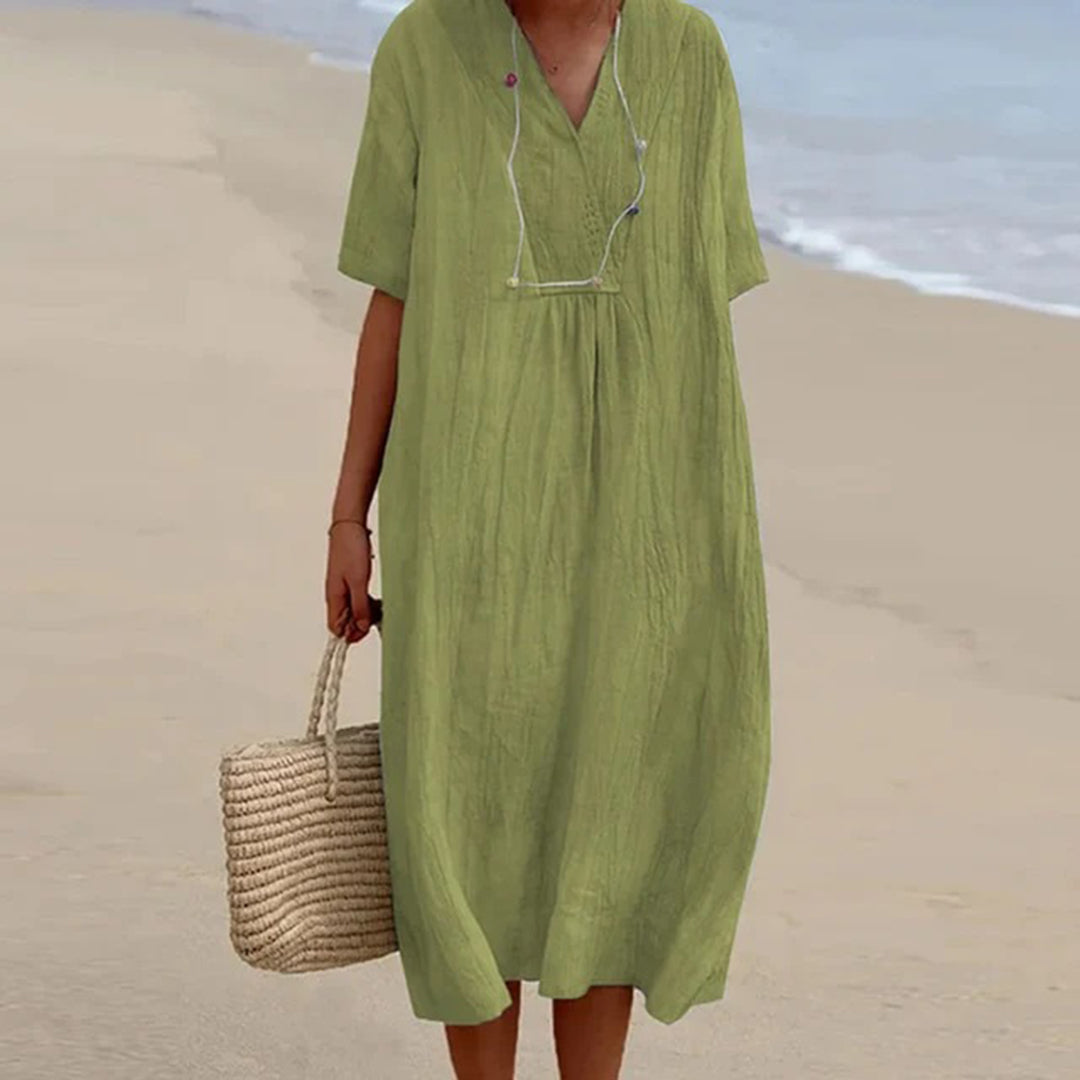 Vestito midi donna per vacanze, spiaggia o serate eleganti. Moda estiva femminile, stile rilassato.