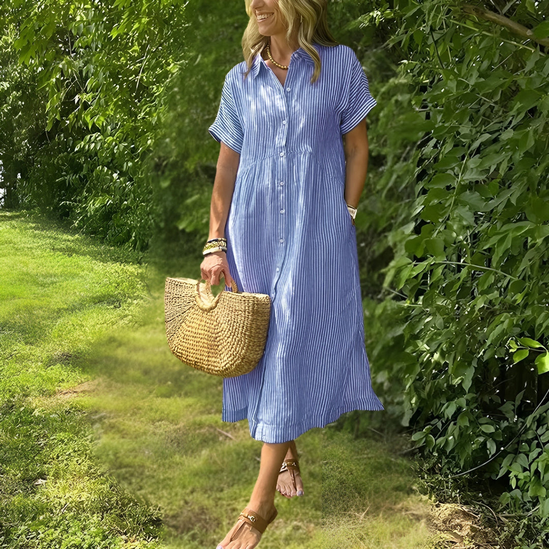 Abito midi estivo a righe per donna, in tessuto leggero e confortevole, ideale per la primavera.