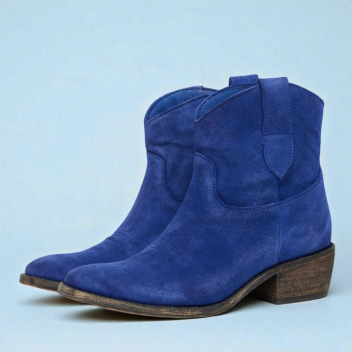 Stivaletti donna stile biker western con tacco largo, robusti e alla moda per l'autunno.