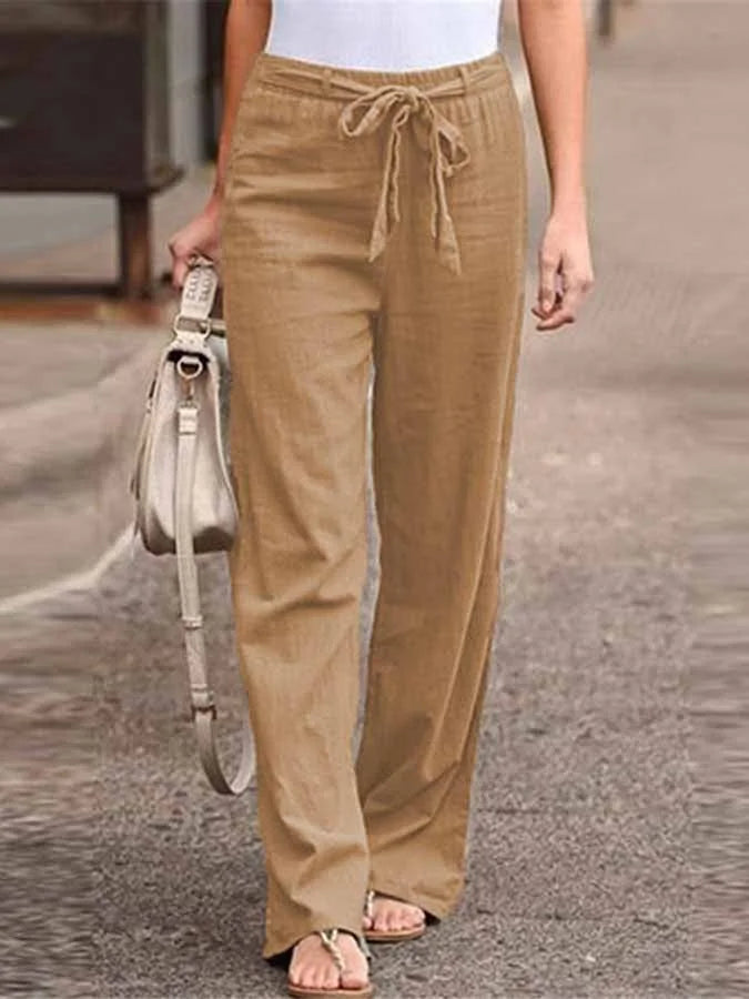 Comodi pantaloni donna estivi a vita alta con gamba ampia e laccio, perfetti per un outfit rilassato e chic.