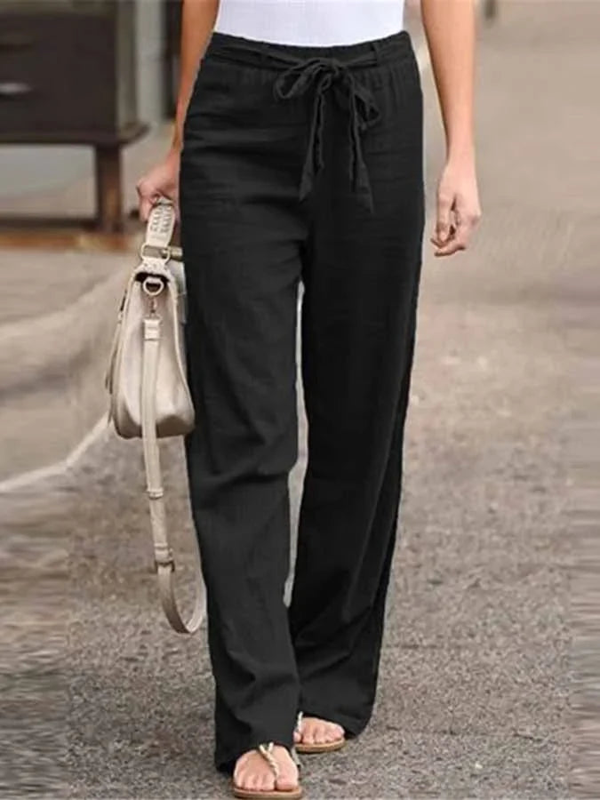 Pantaloni donna estivi versatili a vita alta con laccio, gamba ampia, per outfit casual o più eleganti.