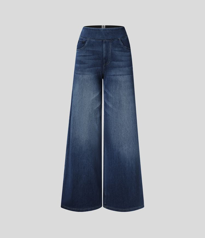 Jeans larghi uomo blu, elasticizzati, strappi e finitura usurata, vestibilità comoda.