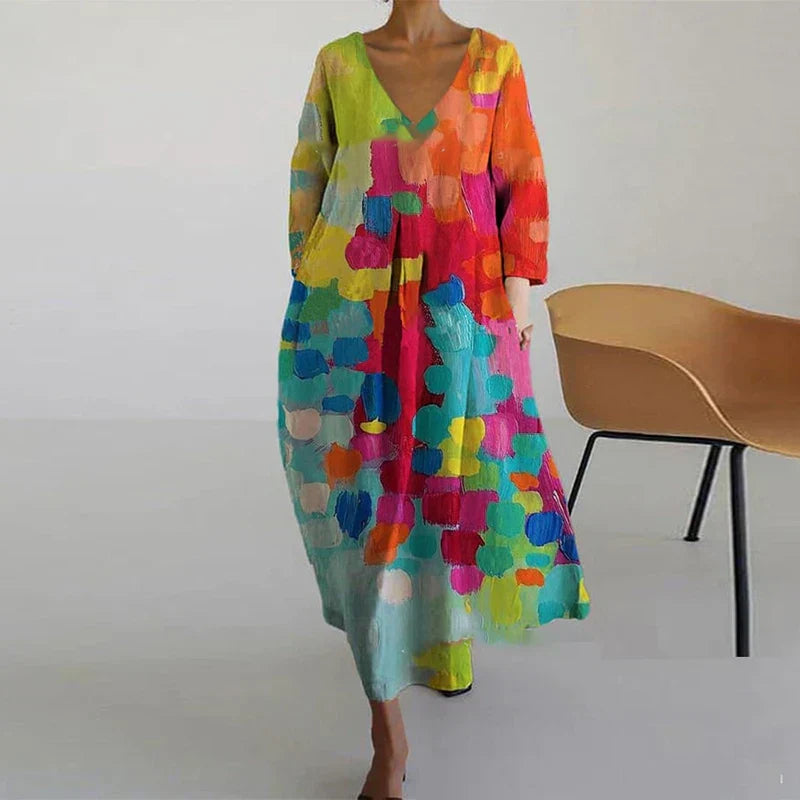 Abito donna svasato casual con stampa floreale e scollo a V, perfetto per l'estate e la moda estiva.