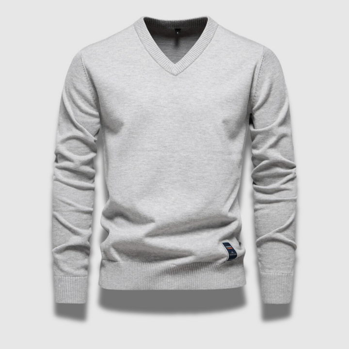Maglione uomo a manica lunga, scollo a V. Caldo e versatile, un must-have per la moda uomo autunno inverno.