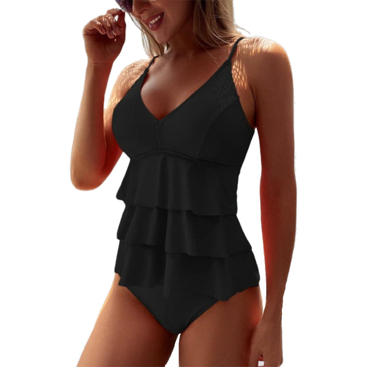 Tankini da donna con volant sul top, scollo a V profondo, ideale per un look chic in spiaggia.
