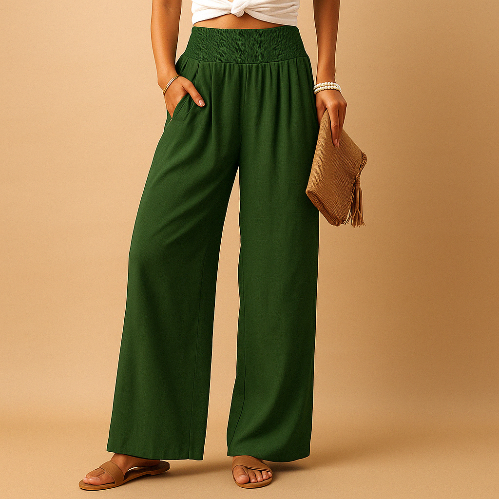 Donna indossa pantaloni a vita alta con gamba larga e tasche. Design moderno, elegante e comodo.