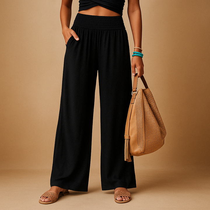 Pantaloni donna in lino a vita alta, eleganti e comodi, perfetti per look casual estivi o primaverili.