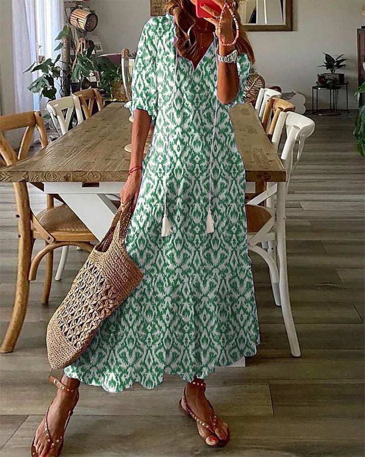 Vestito midi donna versatile, stampa geometrica. Ideale per look casual o elegante estivo.