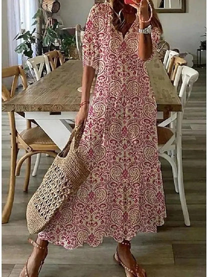 Versatile abito midi donna, stampa geometrica, scollo a V, maniche a lanterna. Adatto per ogni occasione.