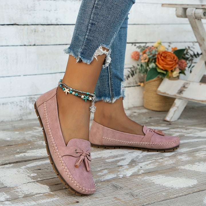 Mocassini donna comodi e versatili, stile slip-on con nappina, perfetti per la primavera e l'autunno.