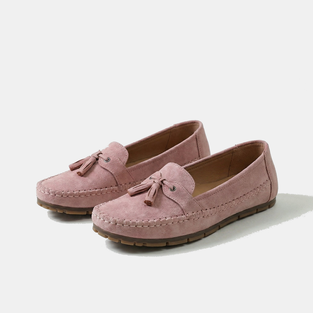 Mocassini donna eleganti slip-on con nappina, perfetti per comfort e stile casual-chic.
