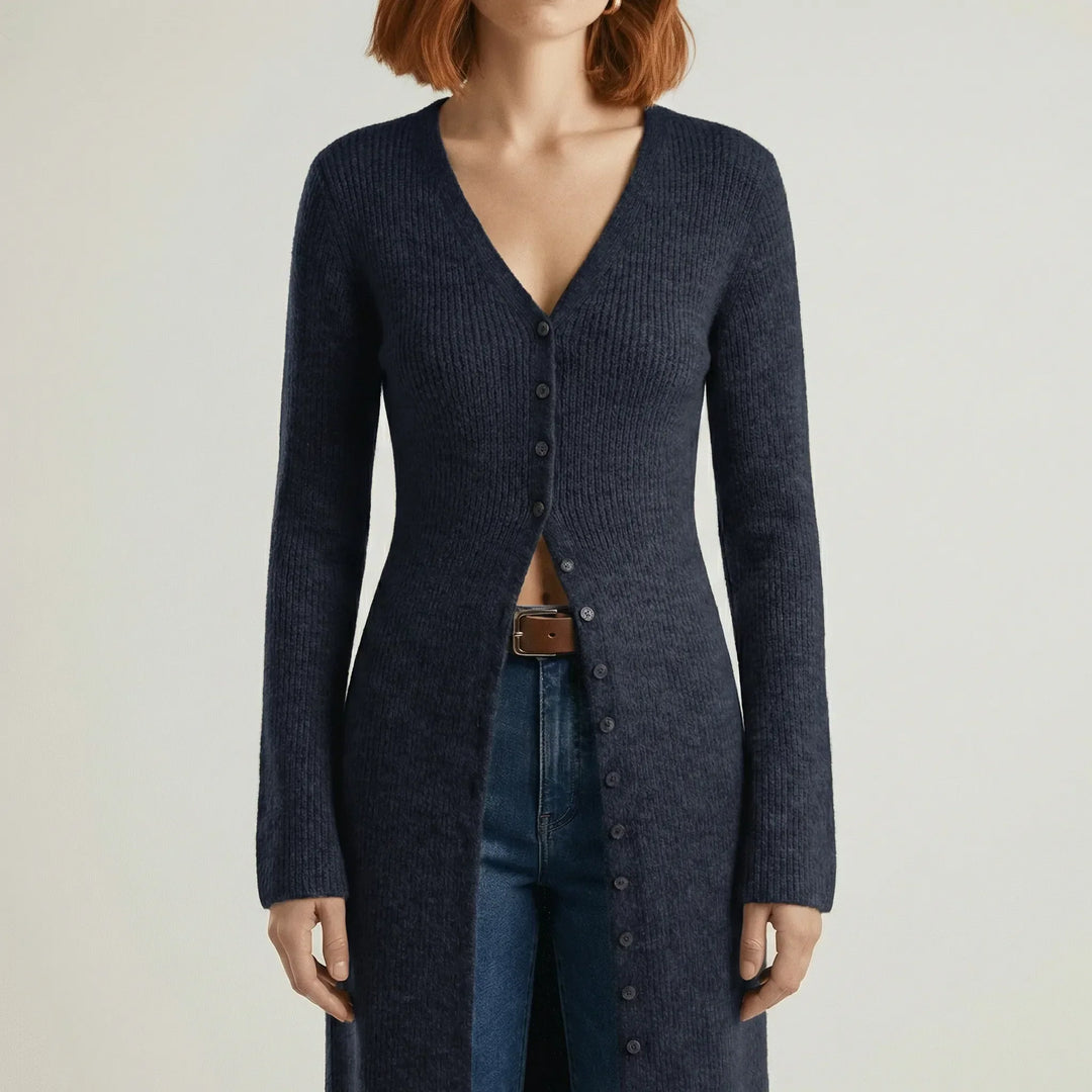 Cardigan lungo donna, essenziale per la moda femminile. Scollo a V, bottoni, maniche svasate.