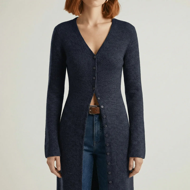 Cardigan lungo donna, essenziale per la moda femminile. Scollo a V, bottoni, maniche svasate.