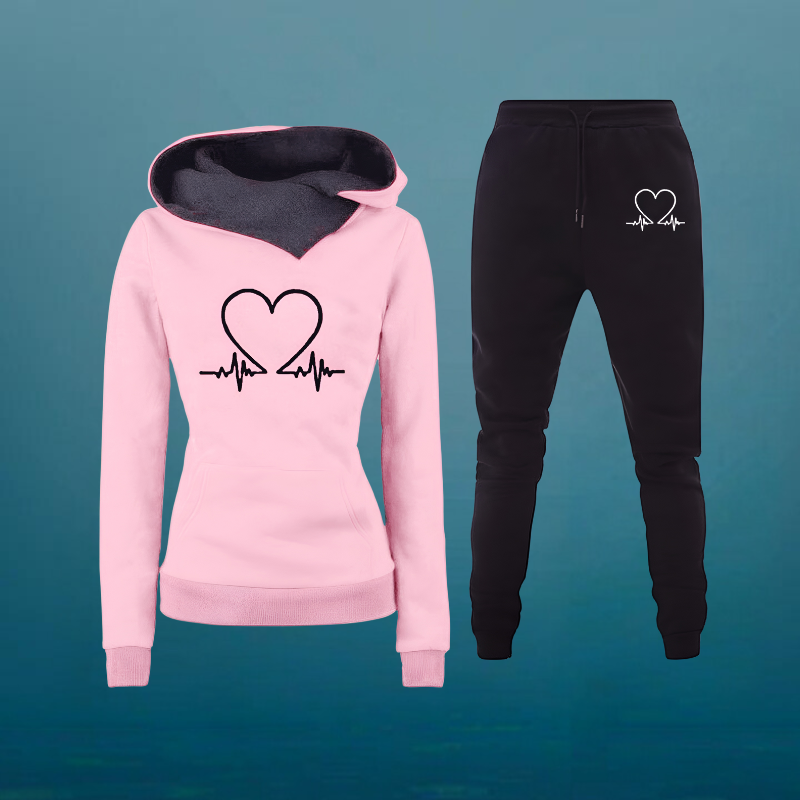 Tuta sportiva donna, completo felpa con cappuccio e pantaloni. Perfetta per comfort, relax e moda casual.