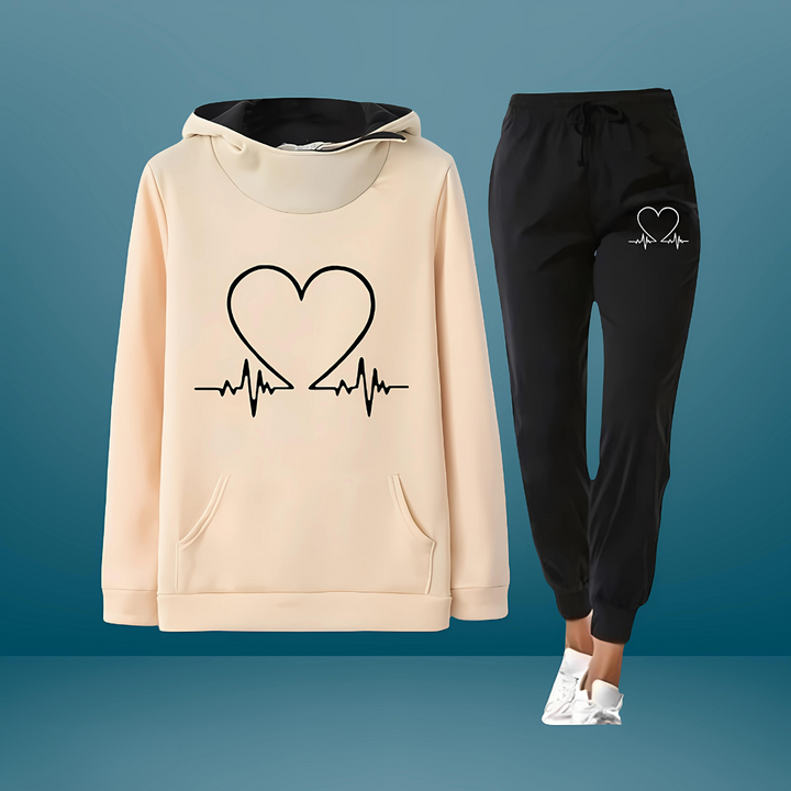 Completo sportivo donna versatile, felpa con cappuccio e pantaloni. Adatto per casual, streetwear e relax.