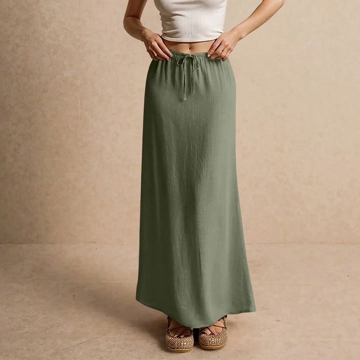 Gonna elegante da donna, design lungo e fluido, ideale per look casual o sofisticati.