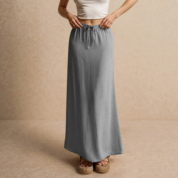 Gonna elegante donna, taglio lungo e fluido, ideale per un look sofisticato e moderno.