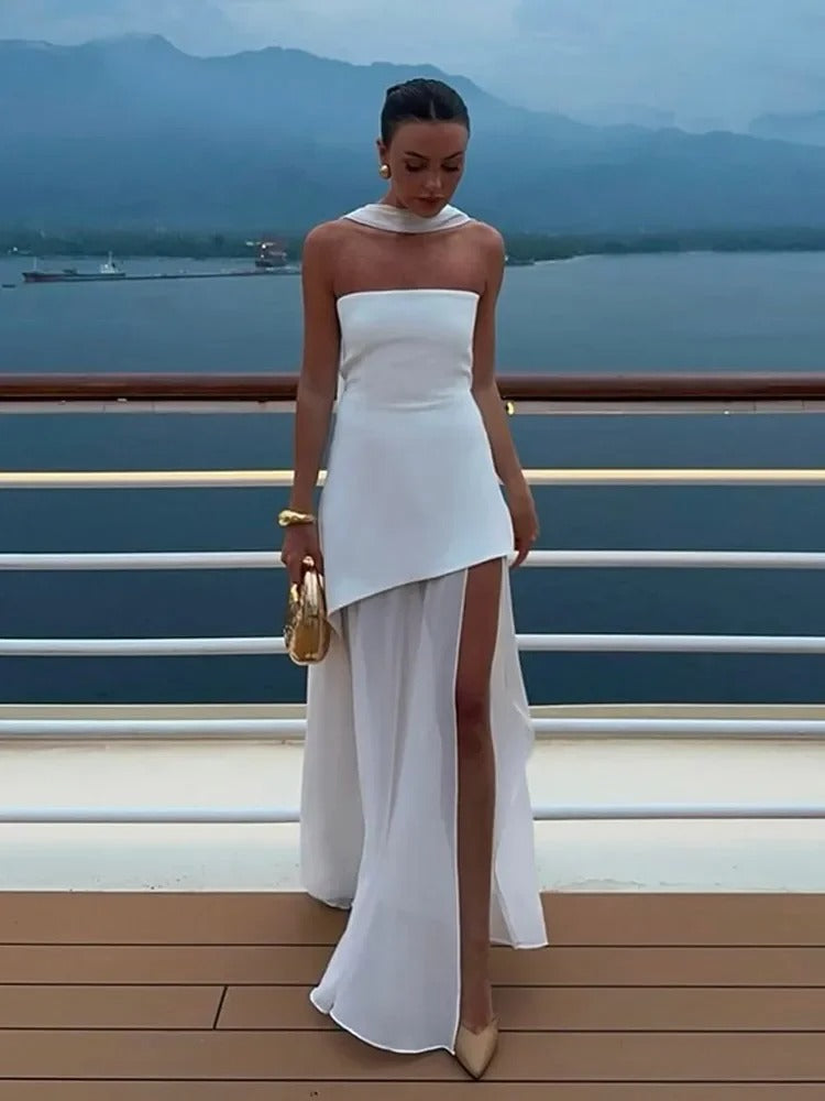 Abito lungo elegante donna per sera e gala, con spacco laterale e silhouette fluida.