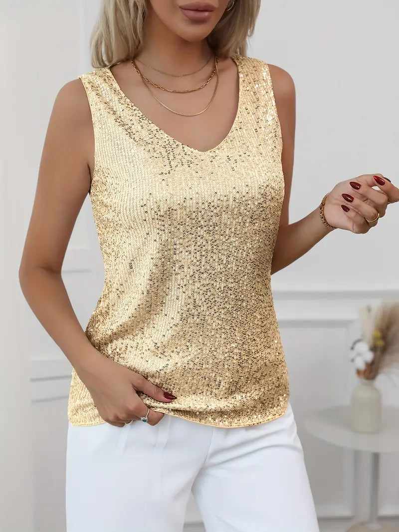 Top donna glamour con scollo a V e paillettes lucide, perfetto per un outfit da sera estivo.