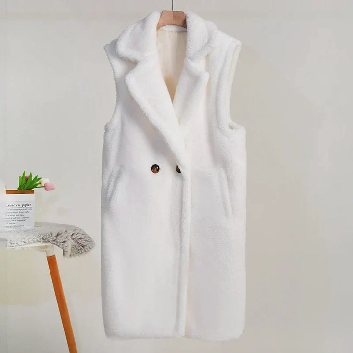 Gilet donna doppiopetto elegante, perfetto per stratificare con stile, da ufficio a casual.