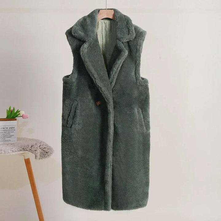 Gilet donna elegante doppiopetto, lungo e senza maniche, per un tocco di classe.