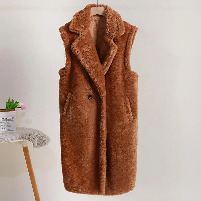 Gilet lungo donna doppiopetto elegante senza maniche per un look raffinato.