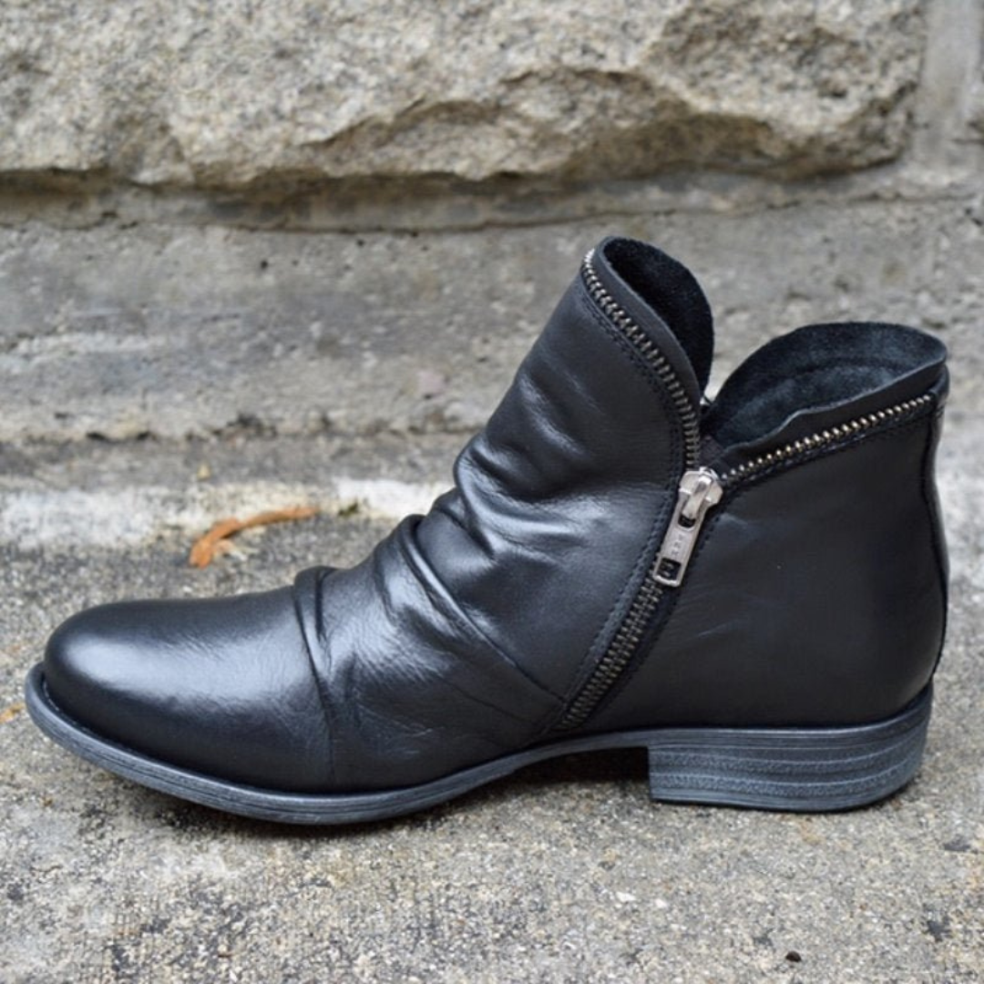 Scarpe comode ortopediche da donna, stivaletti invernali con cerniera per un supporto plantare e stile elegante.