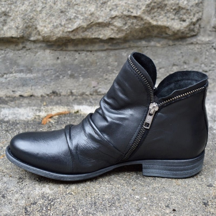 Scarpe comode ortopediche da donna, stivaletti invernali con cerniera per un supporto plantare e stile elegante.