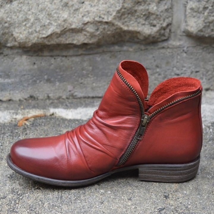 Stivaletti donna ortopedici moderni con cerniera, ideali per comfort e supporto plantare, calzature invernali.