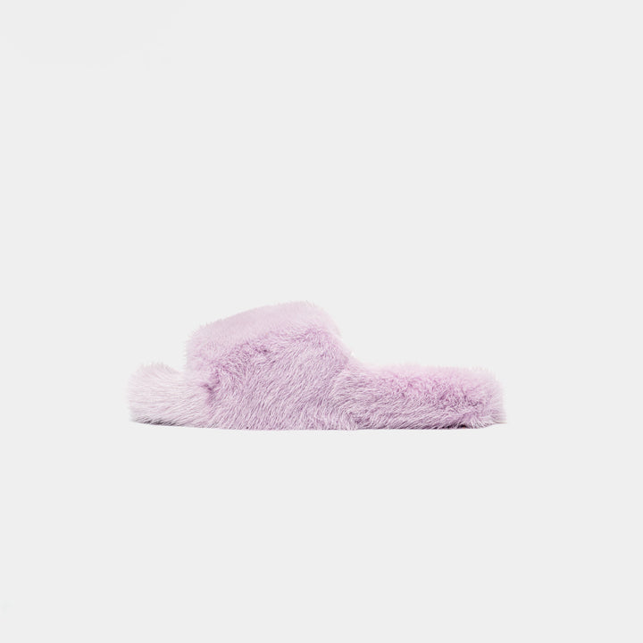 Eleganti pantofole lilla da donna con soffice bordo effetto visone, perfette per stile e relax domestico.