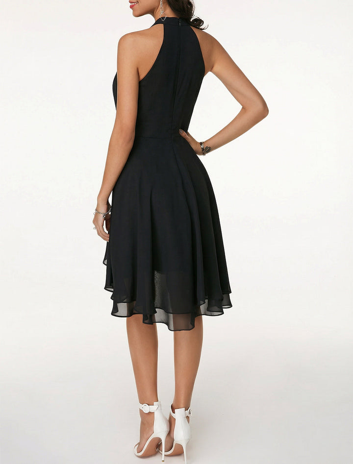 Vestito da invitata matrimonio senza maniche, scollo all'americana, lunghezza ginocchio. Ideale per occasioni speciali.