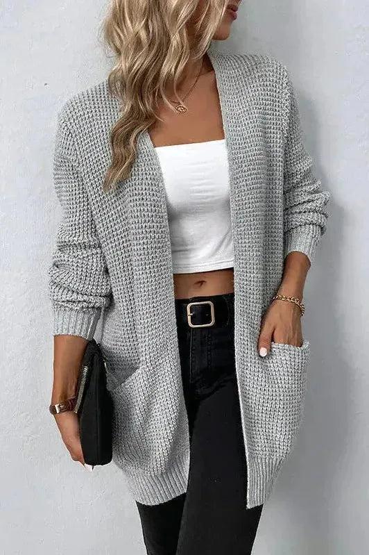 Cardigan donna caldo per autunno inverno, modello aperto con tasche e maniche lunghe.