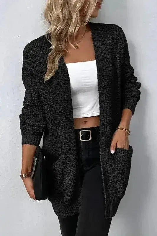 Cardigan donna elegante, aperto e femminile con tasche. Completa il tuo look con stile.