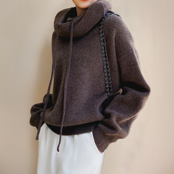 Elegante felpa donna con cappuccio, perfetta per la moda femminile A/I, un comfort avvolgente e casual.