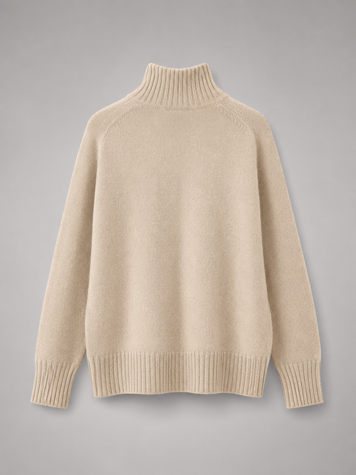 Maglione collo alto donna, taglio oversize, perfetto per un look elegante e quotidiano in autunno/inverno.