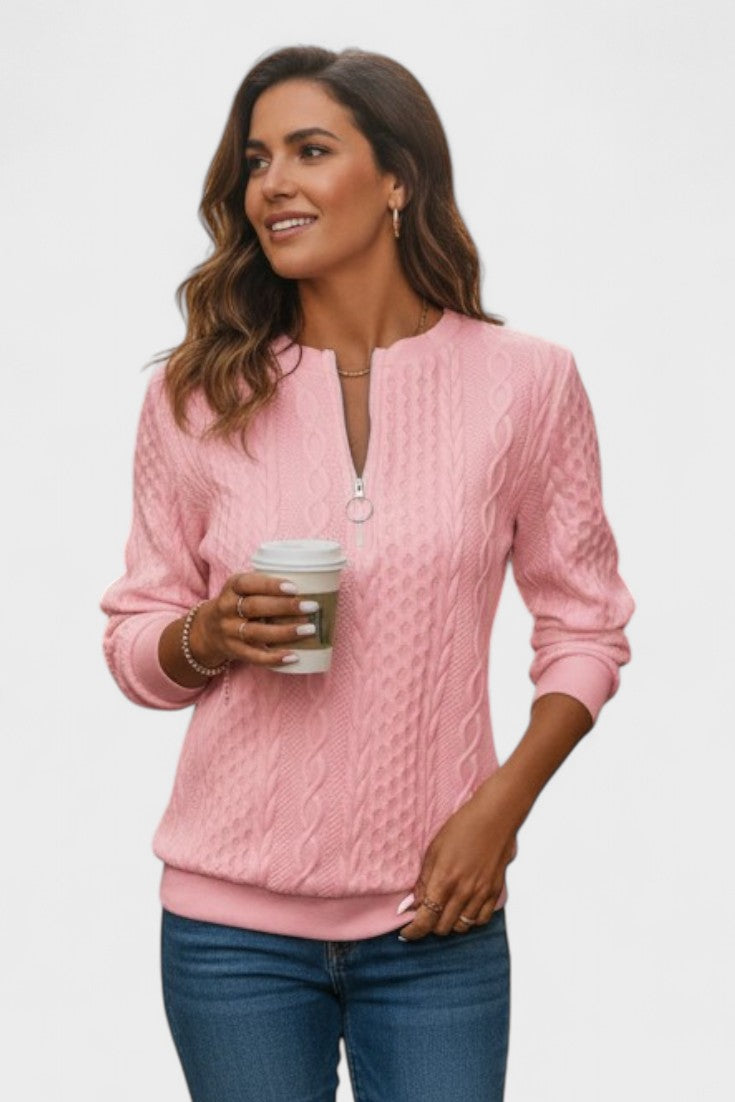 Elegante maglione da donna in maglia con collo alto e pratica mezza zip. Perfetto per l'abbigliamento autunnale.