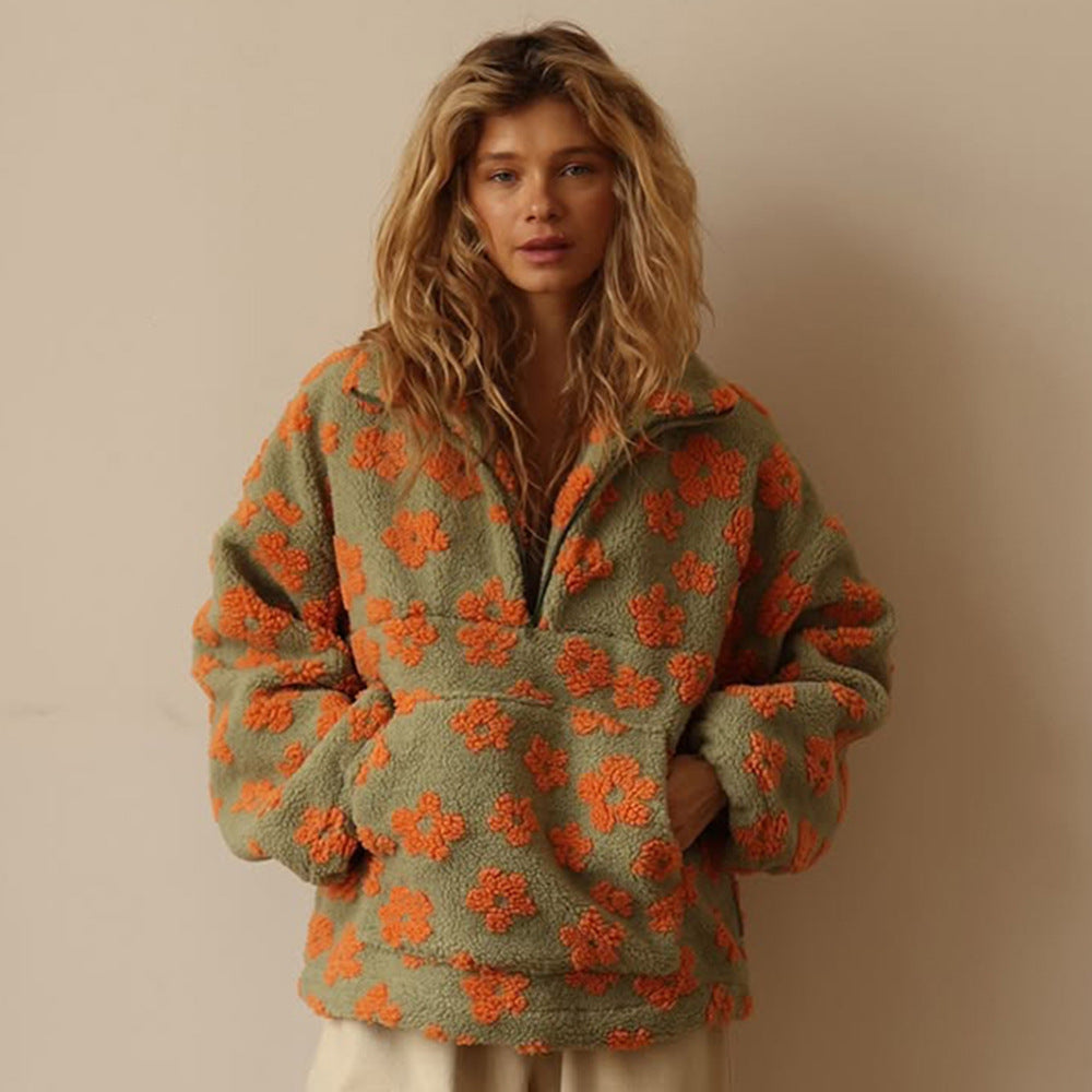Morbido maglione donna floreale effetto teddy, perfetto per serate autunnali e invernali. Caldo e cozy.